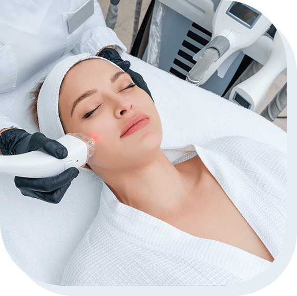 A young woman receiving laser treatment